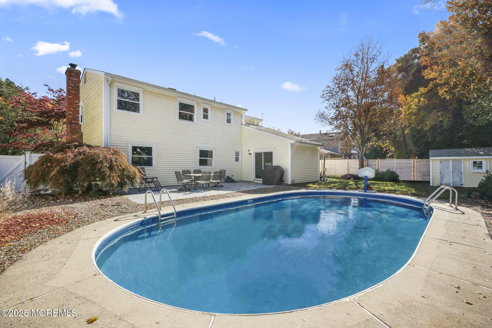 99 Glenarden Drive Howell, NJ 07731 - Photo 33 of 37 a view of a house with swimming pool