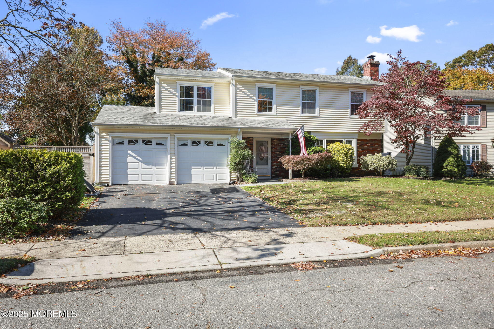 99 Glenarden Drive Howell, NJ 07731 - Photo 4 of 37 a front view of a house with a yard