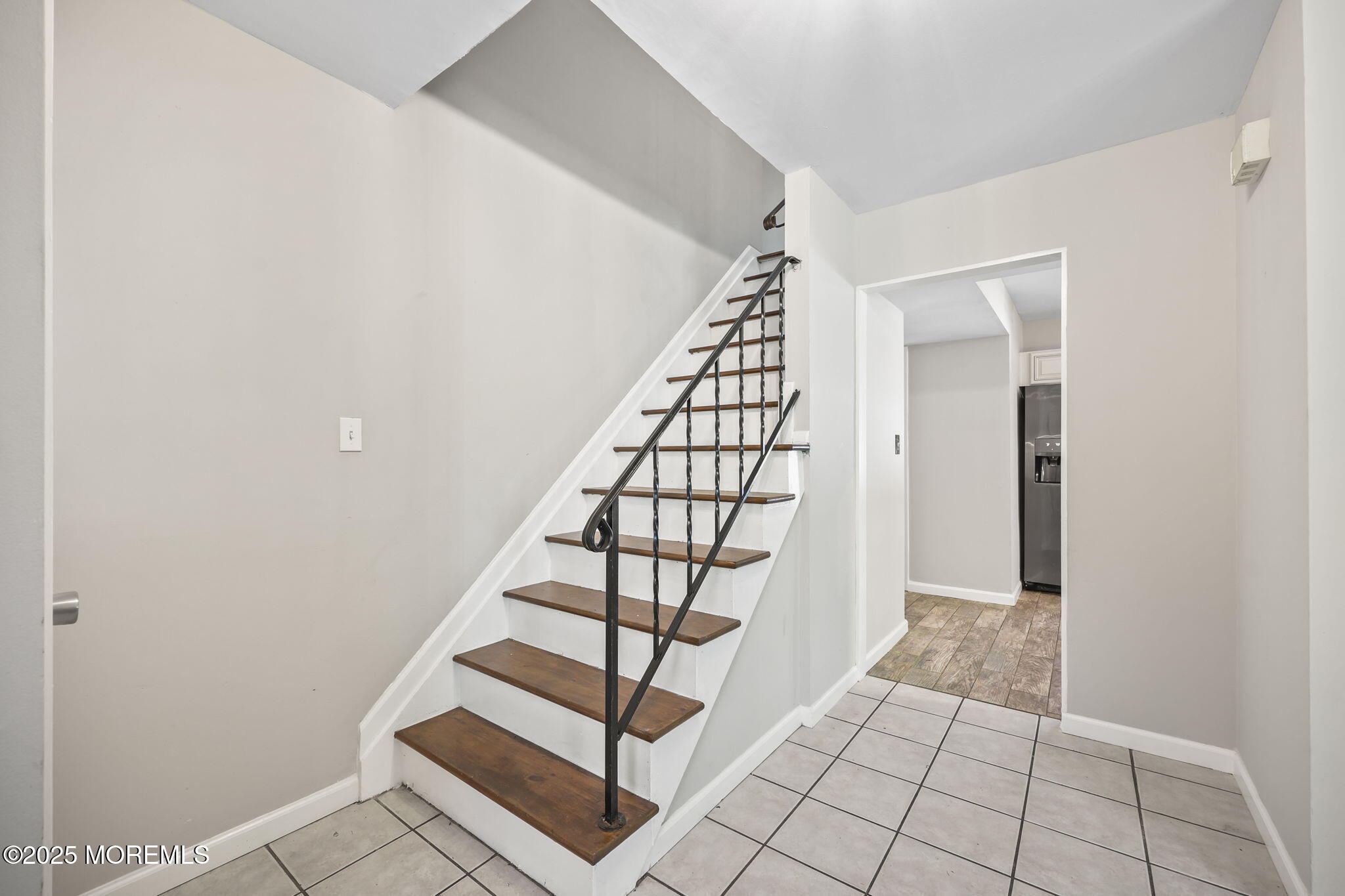 99 Glenarden Drive Howell, NJ 07731 - Photo 7 of 37 a view of entryway with stairs