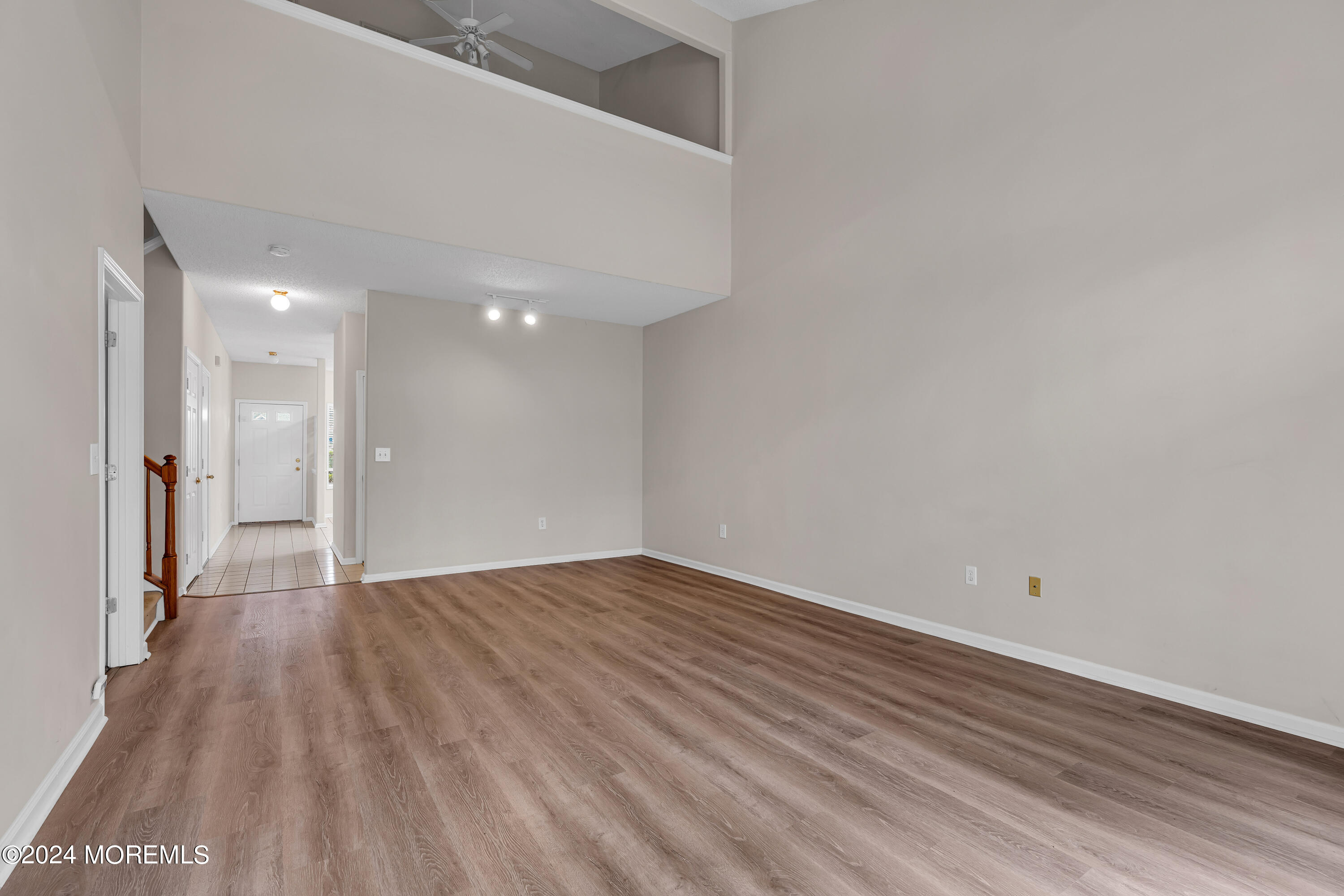 12 Riva Boulevard Brick, NJ 08723 - Photo 16 of 36 a view of an empty room and wooden floor