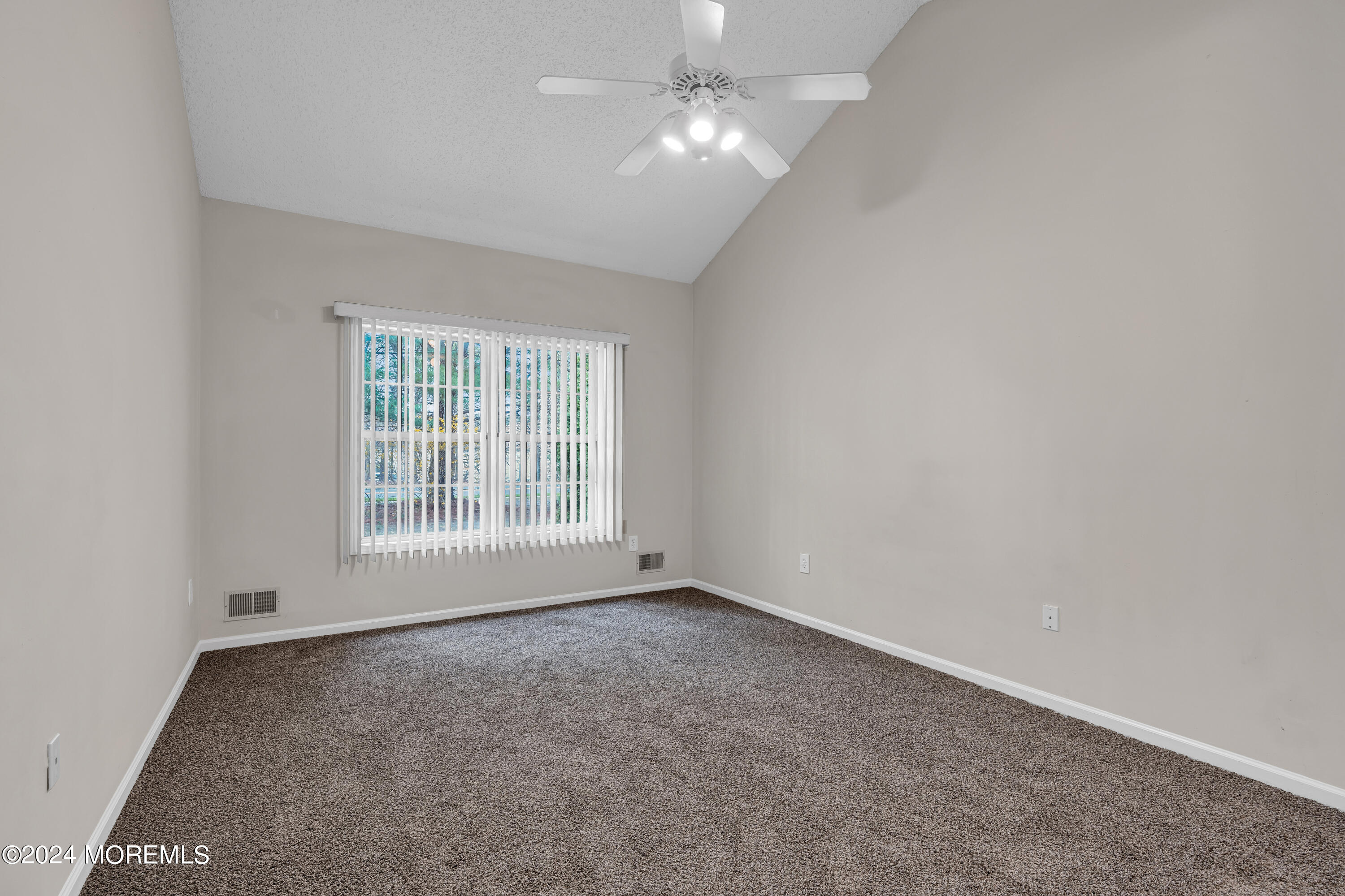 12 Riva Boulevard Brick, NJ 08723 - Photo 17 of 36 wooden floor in an empty room with a window