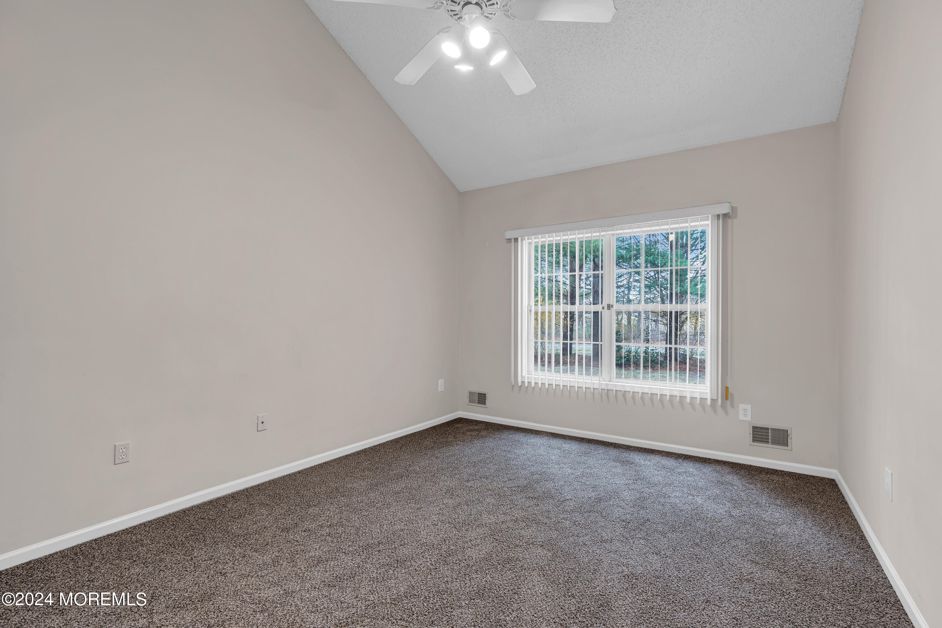 12 Riva Boulevard Brick, NJ 08723 - Photo 20 of 36 an empty room with a window