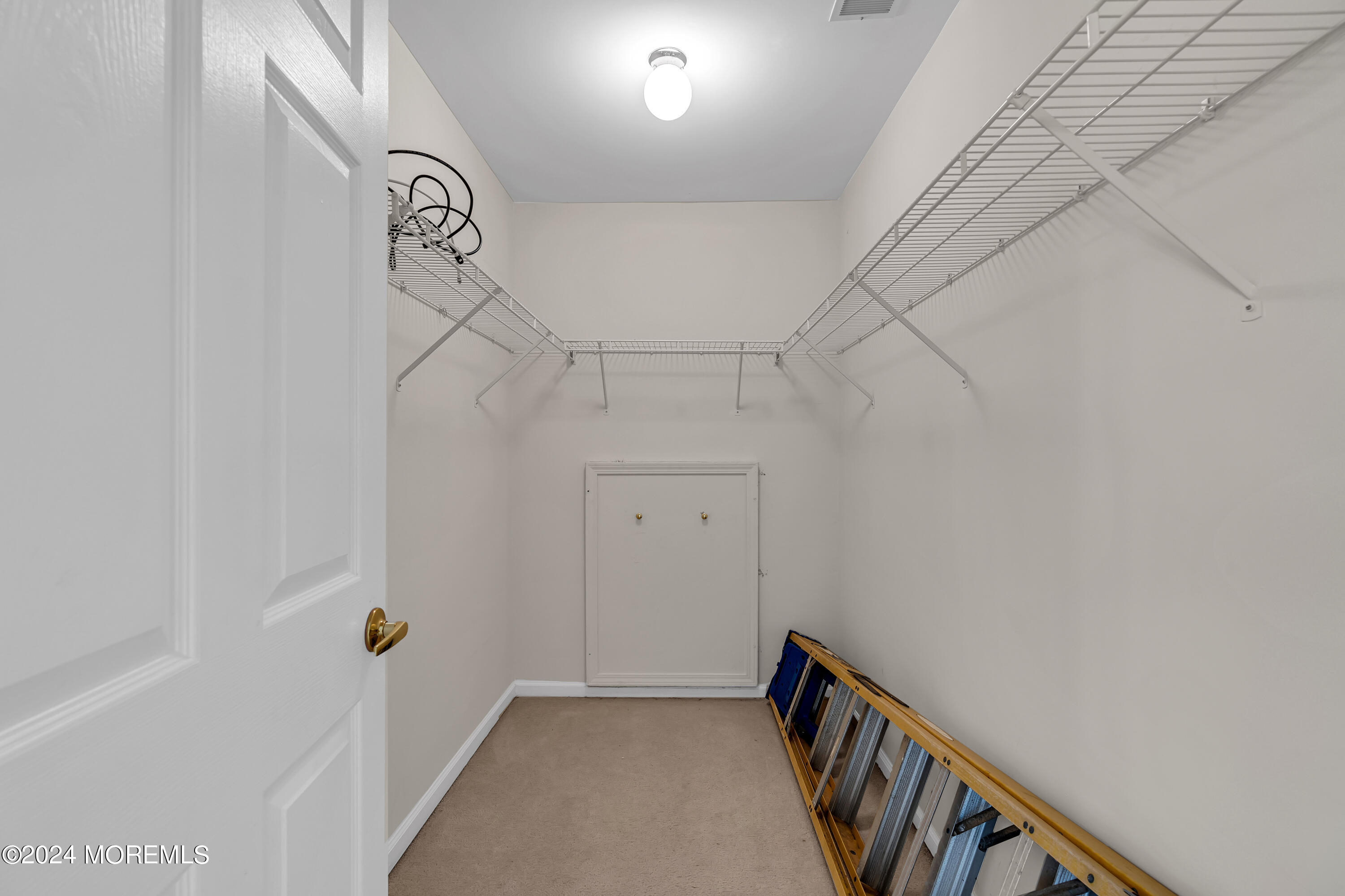 12 Riva Boulevard Brick, NJ 08723 - Photo 32 of 36 a view of a hallway with stairs
