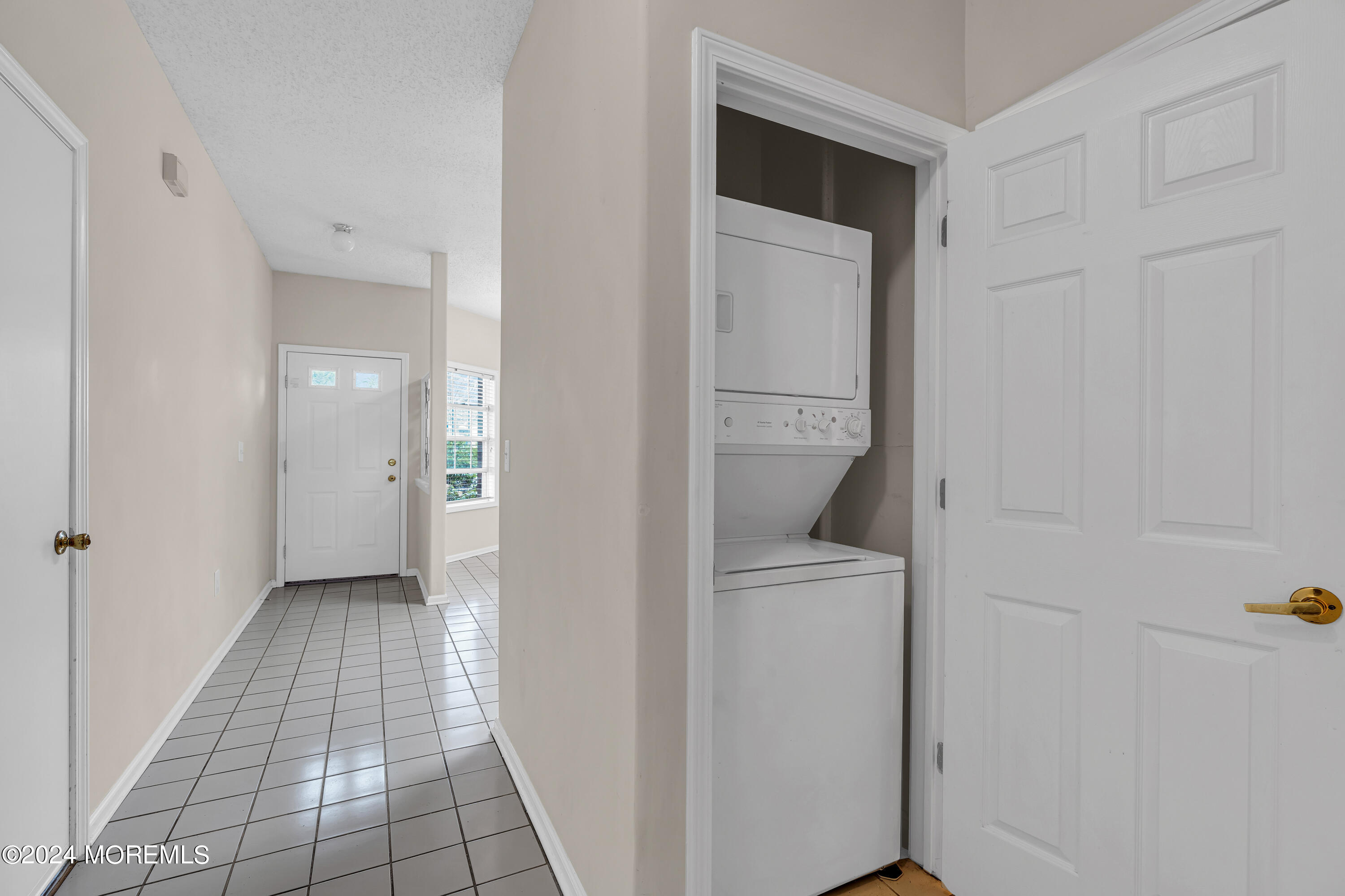 12 Riva Boulevard Brick, NJ 08723 - Photo 33 of 36 a view of a hallway with closet and bathroom
