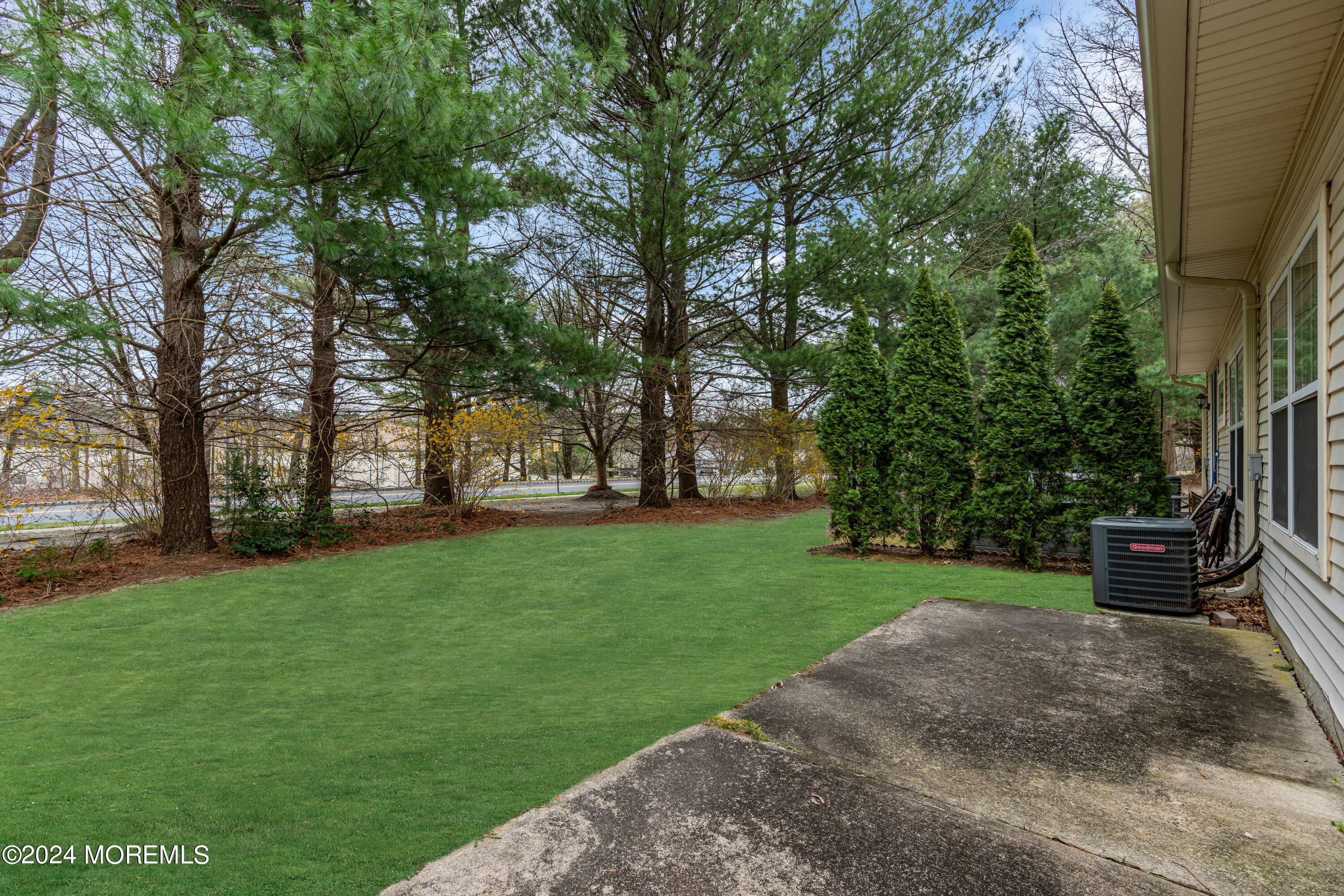 12 Riva Boulevard Brick, NJ 08723 - Photo 34 of 36 a view of a garden with trees