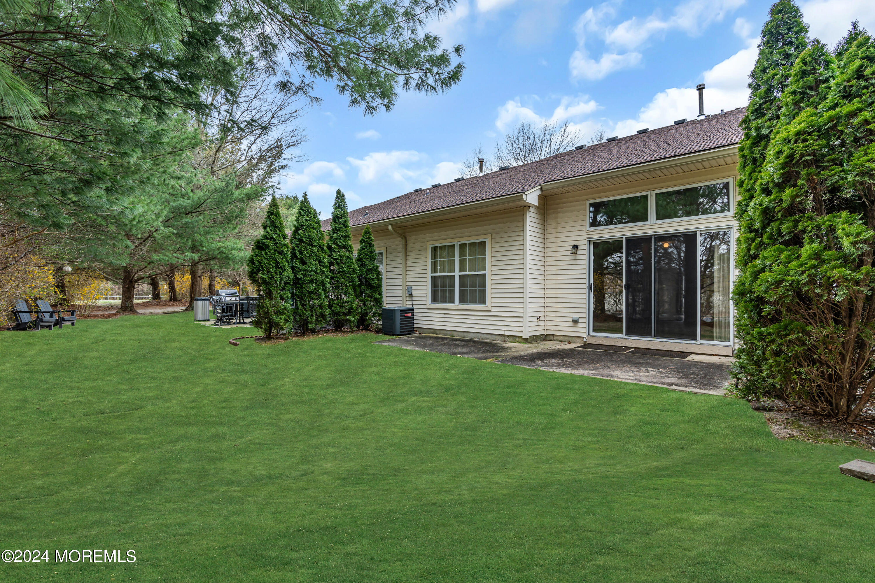 12 Riva Boulevard Brick, NJ 08723 - Photo 35 of 36 a view of a house with a backyard