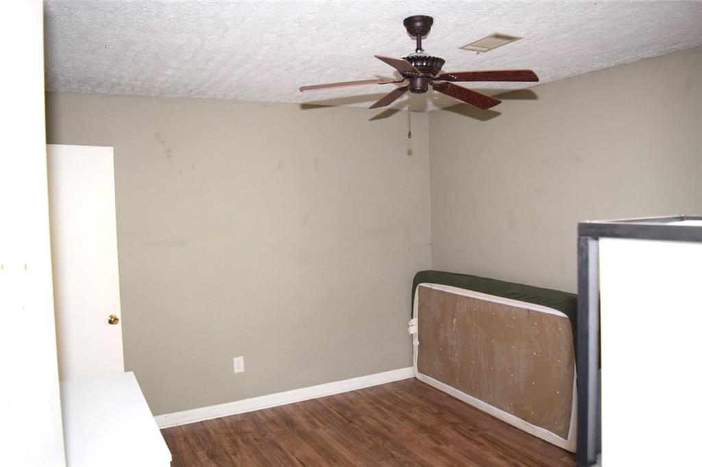 705 Triune Mill Road Thomaston, GA 30286 - Photo 22 of 34 a view of an empty room with a window