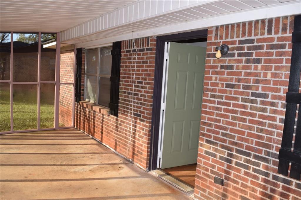 705 Triune Mill Road Thomaston, GA 30286 - Photo 3 of 34 a view of a door and a balcony