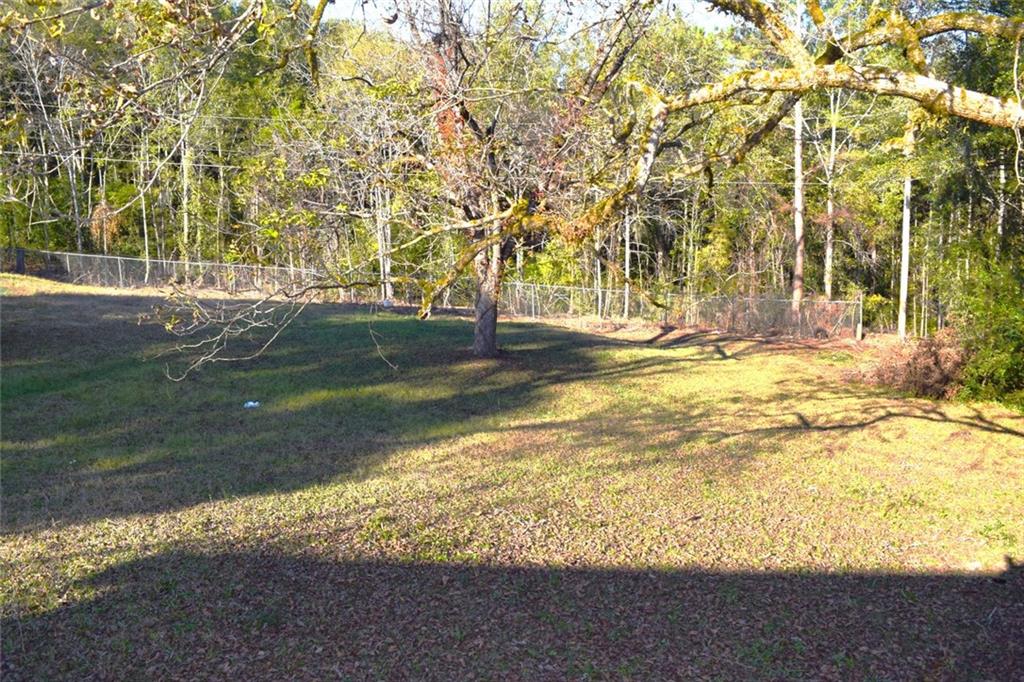 705 Triune Mill Road Thomaston, GA 30286 - Photo 32 of 34 a view of yard with large trees