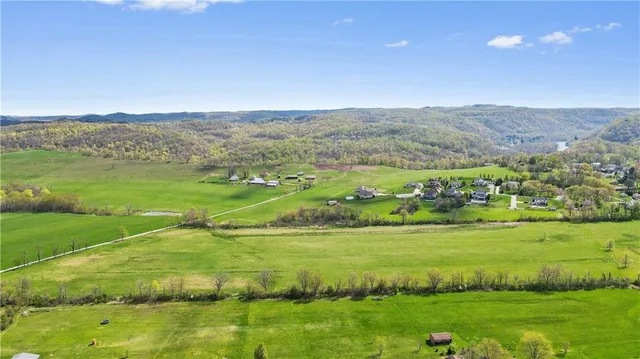 a view of a city with mountains in the background