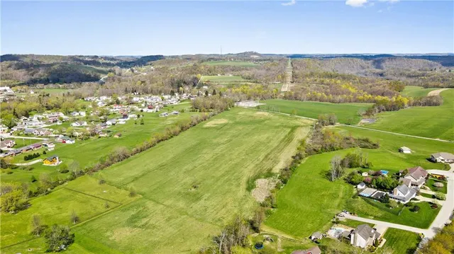 a view of a city with an ocean