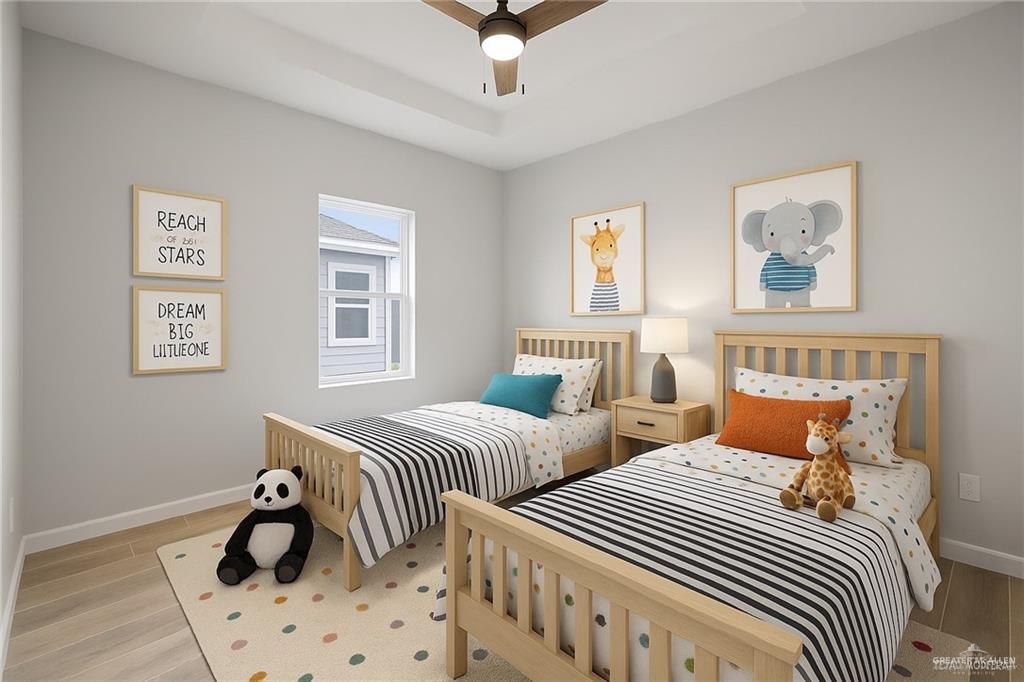 9206 North 56th Lane, Unit 4 Mission, TX 78573 - Photo 12 of 14 a bedroom with two beds and a window