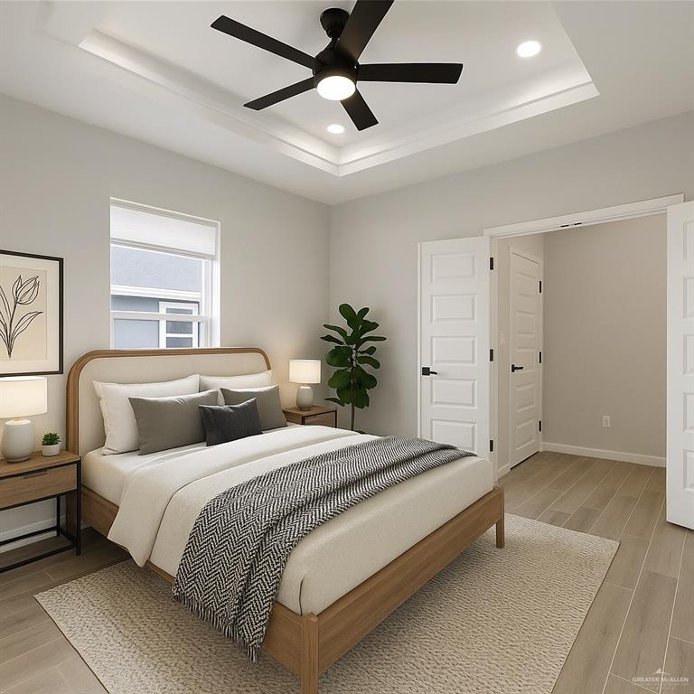 9206 North 56th Lane, Unit 4 Mission, TX 78573 - Photo 14 of 14 a bedroom with bed and a chandelier