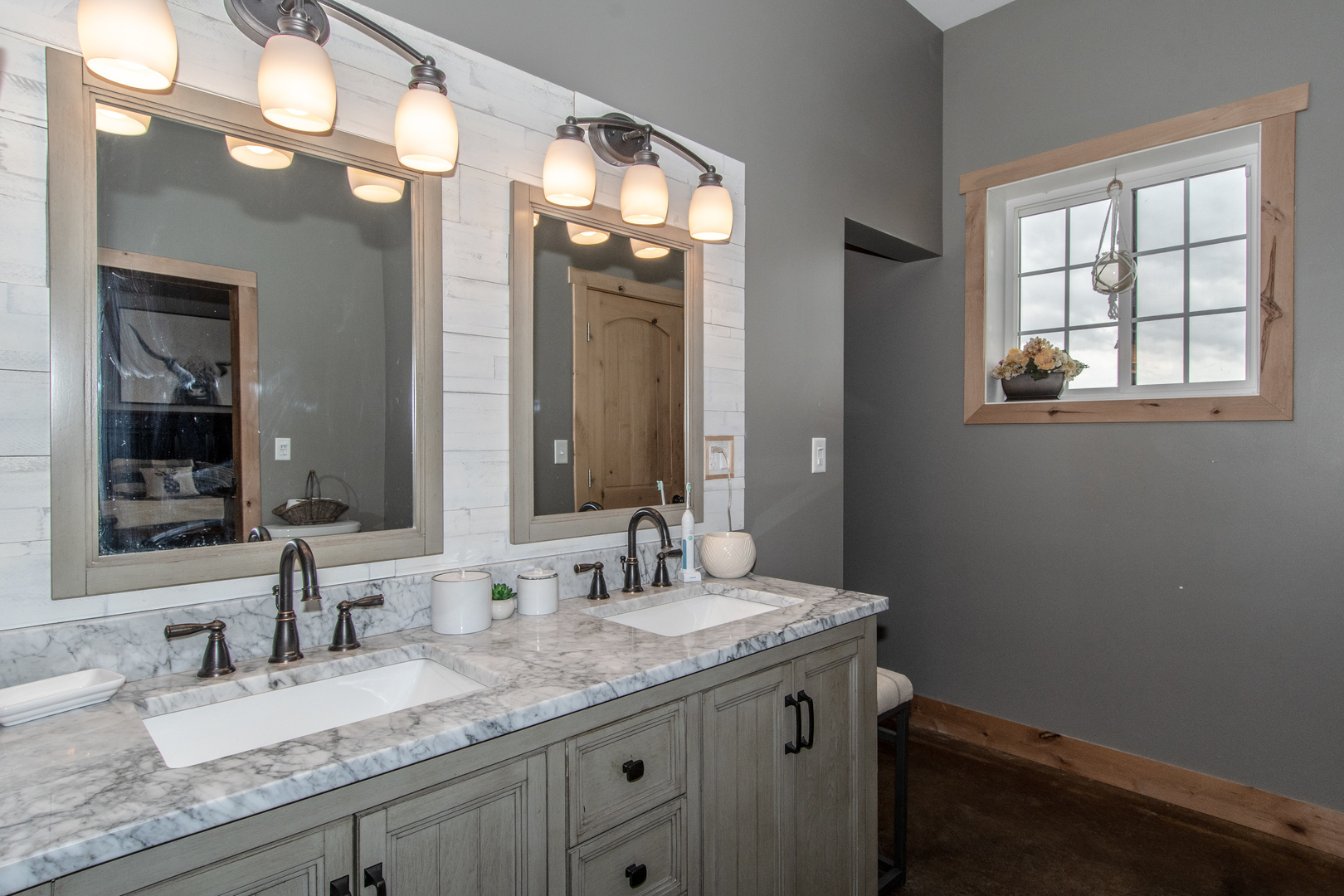 1255 West Dupont Road Morris, IL 60450 - Photo 20 of 26 a bathroom with a granite countertop sink and a mirror