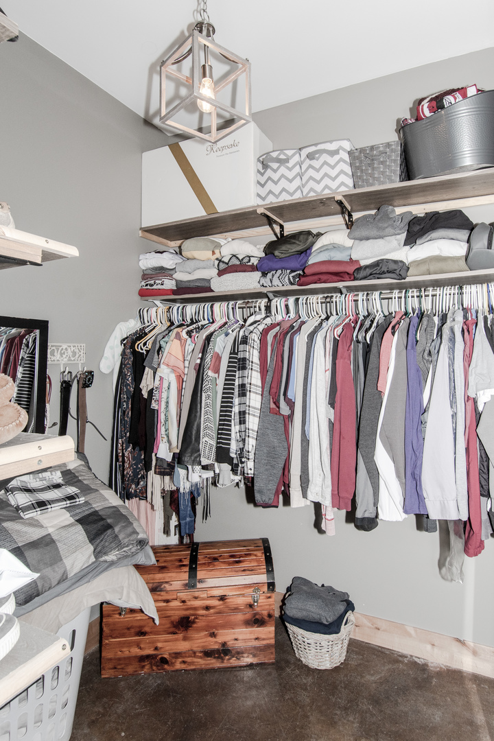 1255 West Dupont Road Morris, IL 60450 - Photo 22 of 26 a view of walk in closet with clothes