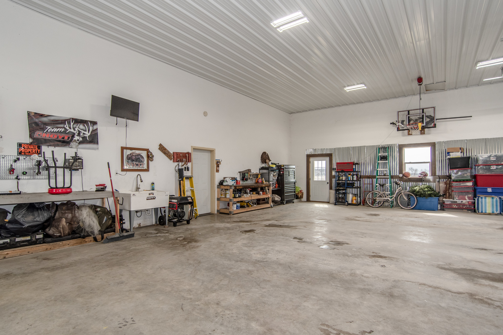 1255 West Dupont Road Morris, IL 60450 - Photo 26 of 26 a view of a livingroom with furniture and a garage