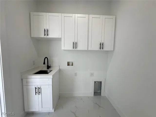 a view of cabinets with wooden floor