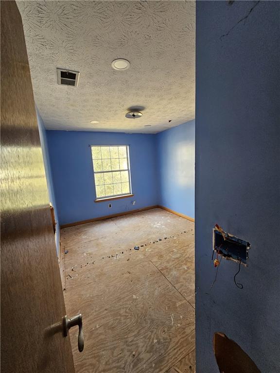 3738 Sandy Shoals Lane Decatur, GA 30034 - Photo 19 of 38 a view of an empty room with a window