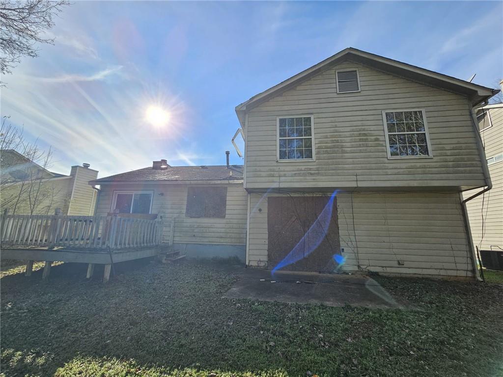 3738 Sandy Shoals Lane Decatur, GA 30034 - Photo 32 of 38 a front view of a house with a yard