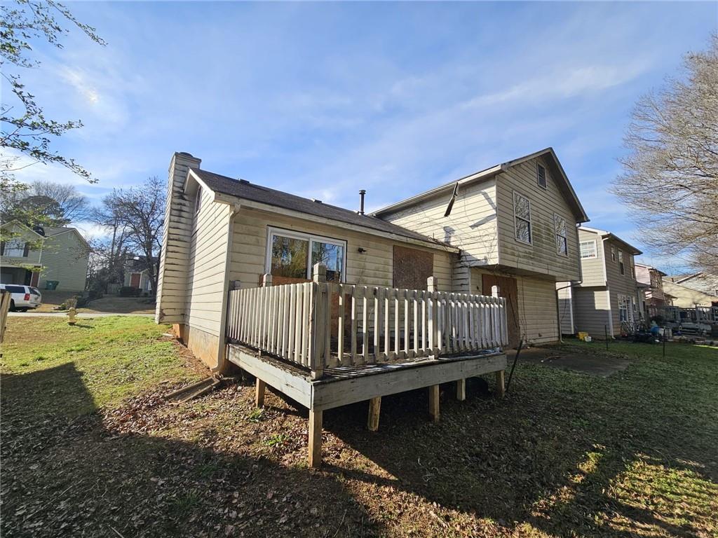 3738 Sandy Shoals Lane Decatur, GA 30034 - Photo 34 of 38 a view of a house with a yard and deck