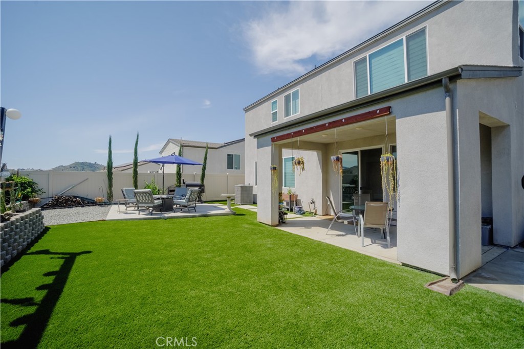 35323 Orchard Trail Fallbrook, CA 92028 - Photo 25 of 32 a view of a house with backyard porch and sitting area