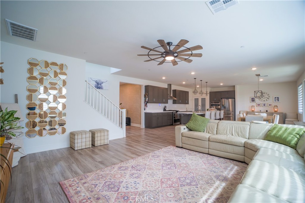35323 Orchard Trail Fallbrook, CA 92028 - Photo 7 of 32 a living room with furniture and kitchen view