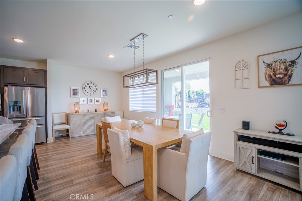 35323 Orchard Trail Fallbrook, CA 92028 - Photo 8 of 32 a dining room with furniture window and wooden floor