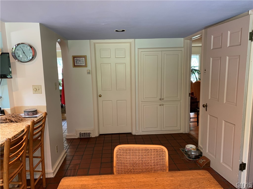 215 Dewitt Road Syracuse, NY 13214 - Photo 15 of 49 Looking in from the French doors, the door on the