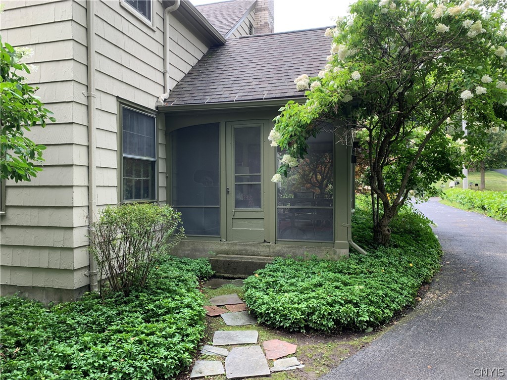 215 Dewitt Road Syracuse, NY 13214 - Photo 29 of 49 The porch door leads to the back yard