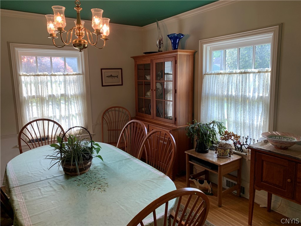 215 Dewitt Road Syracuse, NY 13214 - Photo 6 of 49 The large dining room with two oversized windows a