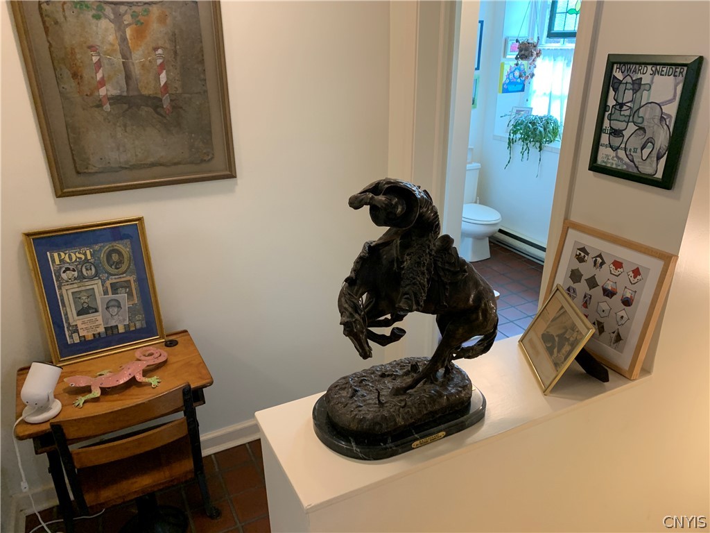 215 Dewitt Road Syracuse, NY 13214 - Photo 9 of 49 Near the reading area is a full bath on the first