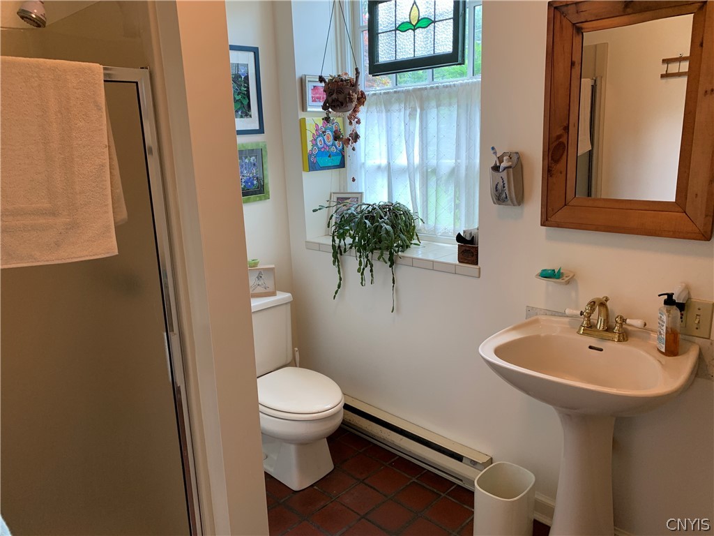 215 Dewitt Road Syracuse, NY 13214 - Photo 10 of 49 Plenty of natural light in the full bath