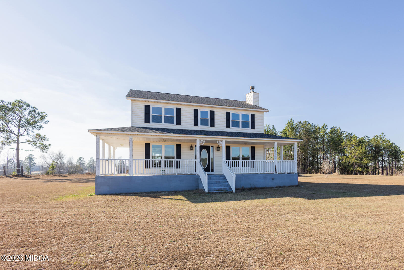 1578 Edsel Senn Road Rockledge, GA 30454 - Photo 1 of 32 a front view of a house with a yard