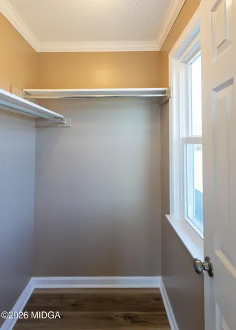 a view of small space with racks on the wall