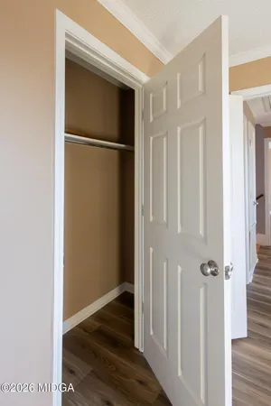 a view of a closet in a room