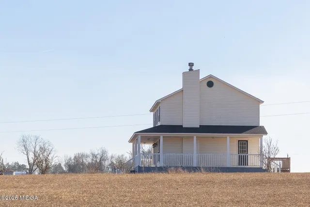 a view of swimming pool and lake