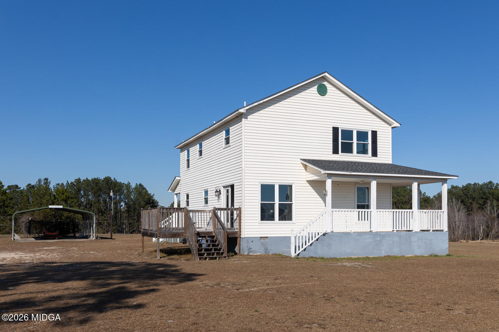 1578 Edsel Senn Road Rockledge, GA 30454 - Photo 27 of 32 a view of a house with a patio