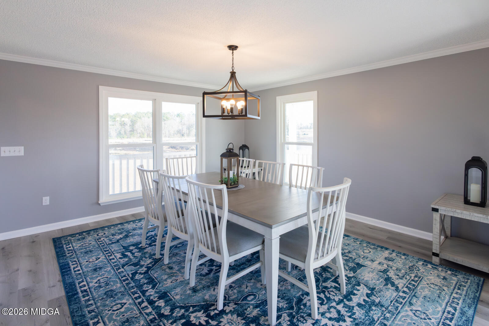 1578 Edsel Senn Road Rockledge, GA 30454 - Photo 7 of 32 a view of a dining room with furniture window and wooden floor