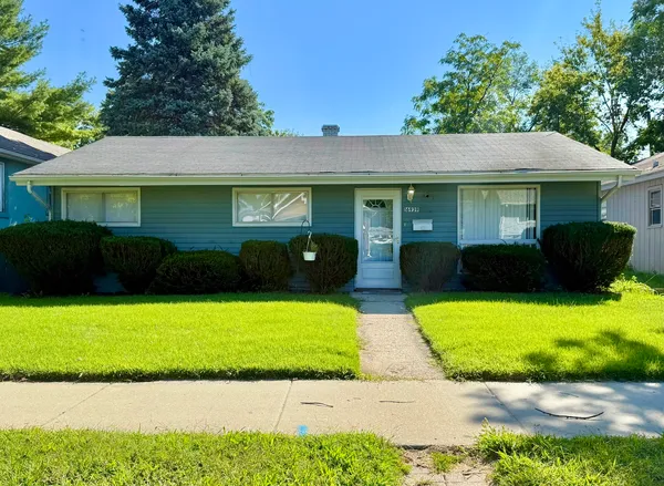 a view of a house with a garden