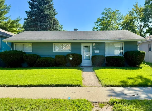 a view of a house with a garden