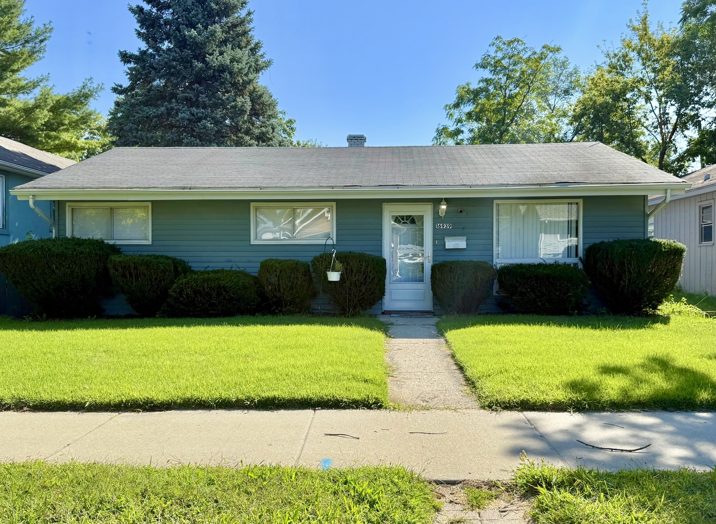 a view of a house with a garden