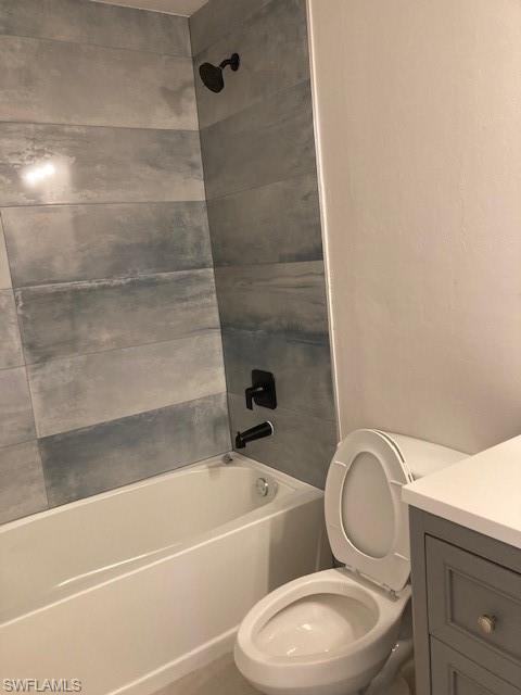2134 Davis Street Fort Myers, FL 33916 - Photo 6 of 9 a bathroom with a toilet a sink and bathtub