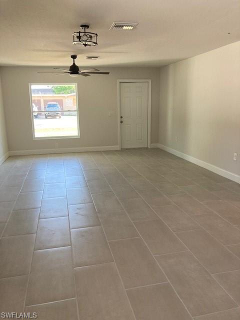 2134 Davis Street Fort Myers, FL 33916 - Photo 8 of 9 a view of an empty room with a window