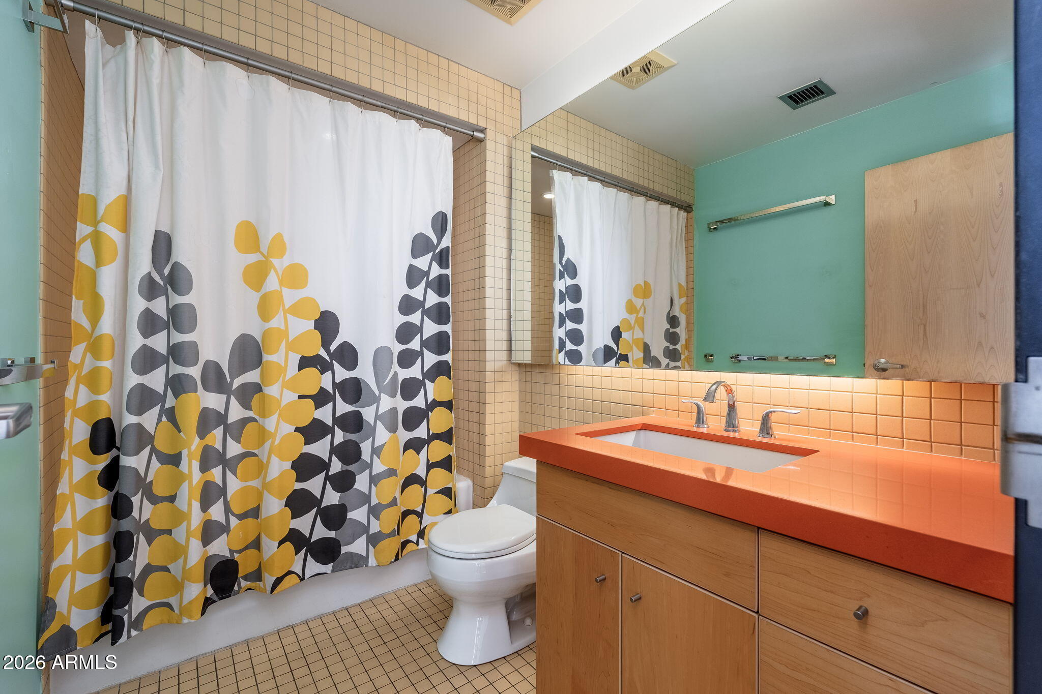 727 East Portland Street, Unit 6 Phoenix, AZ 85006 - Photo 12 of 31 a bathroom with a sink and a mirror