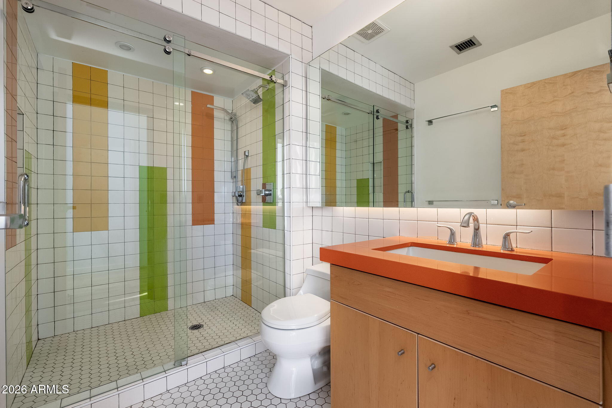 727 East Portland Street, Unit 6 Phoenix, AZ 85006 - Photo 17 of 31 a bathroom with a sink a toilet and shower