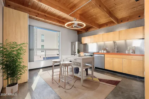 a picture of a bench in front of a wall