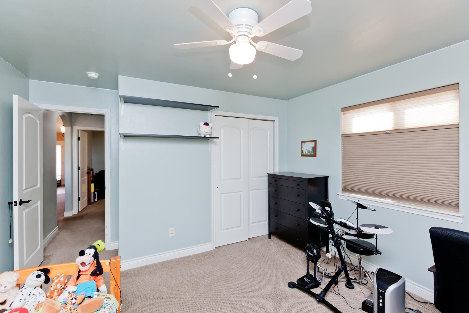 1037 Wingate Drive Fruita, CO 81521 - Photo 23 of 42 a view of a workspace with furniture and a window