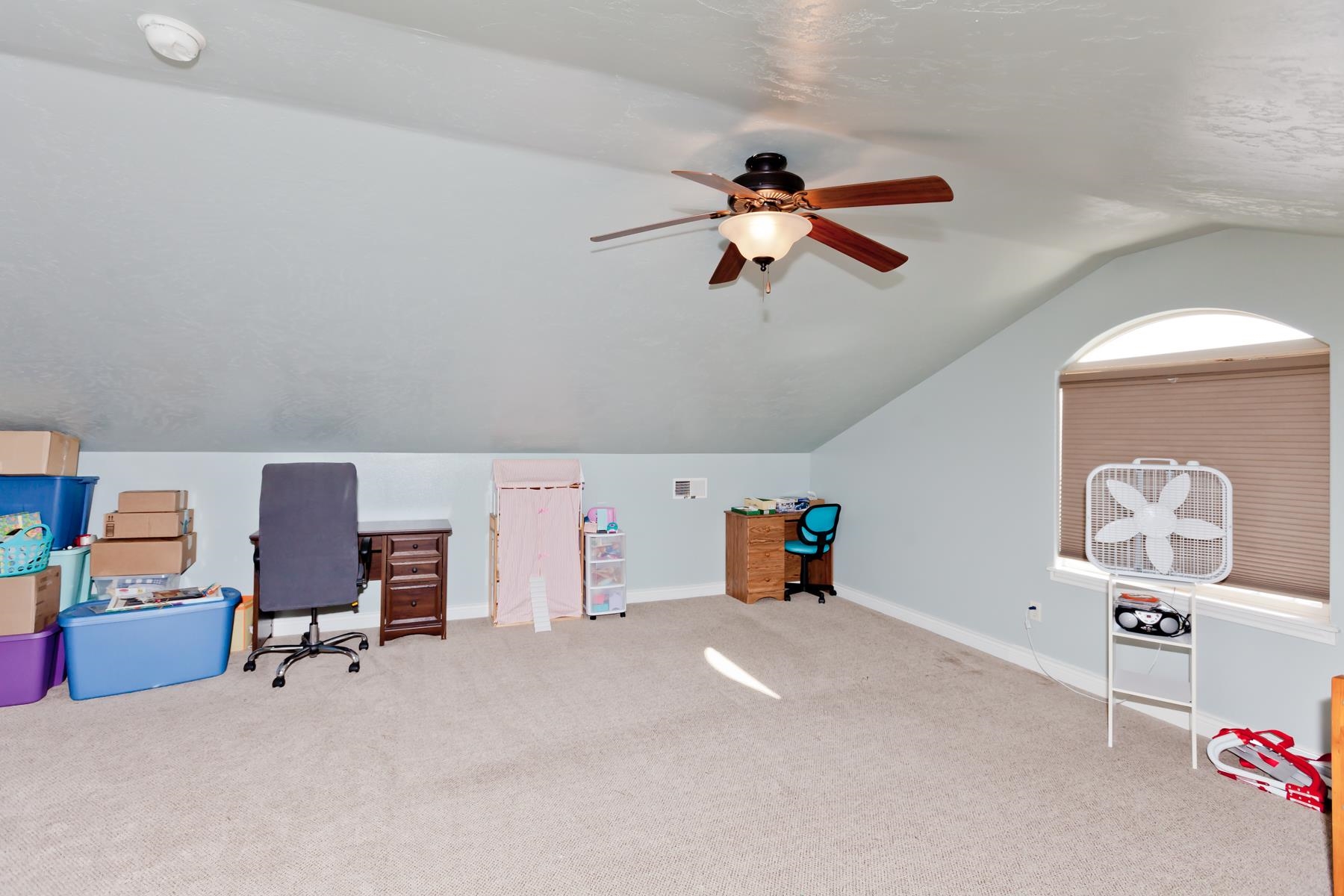 1037 Wingate Drive Fruita, CO 81521 - Photo 30 of 42 a view of a workspace with furniture