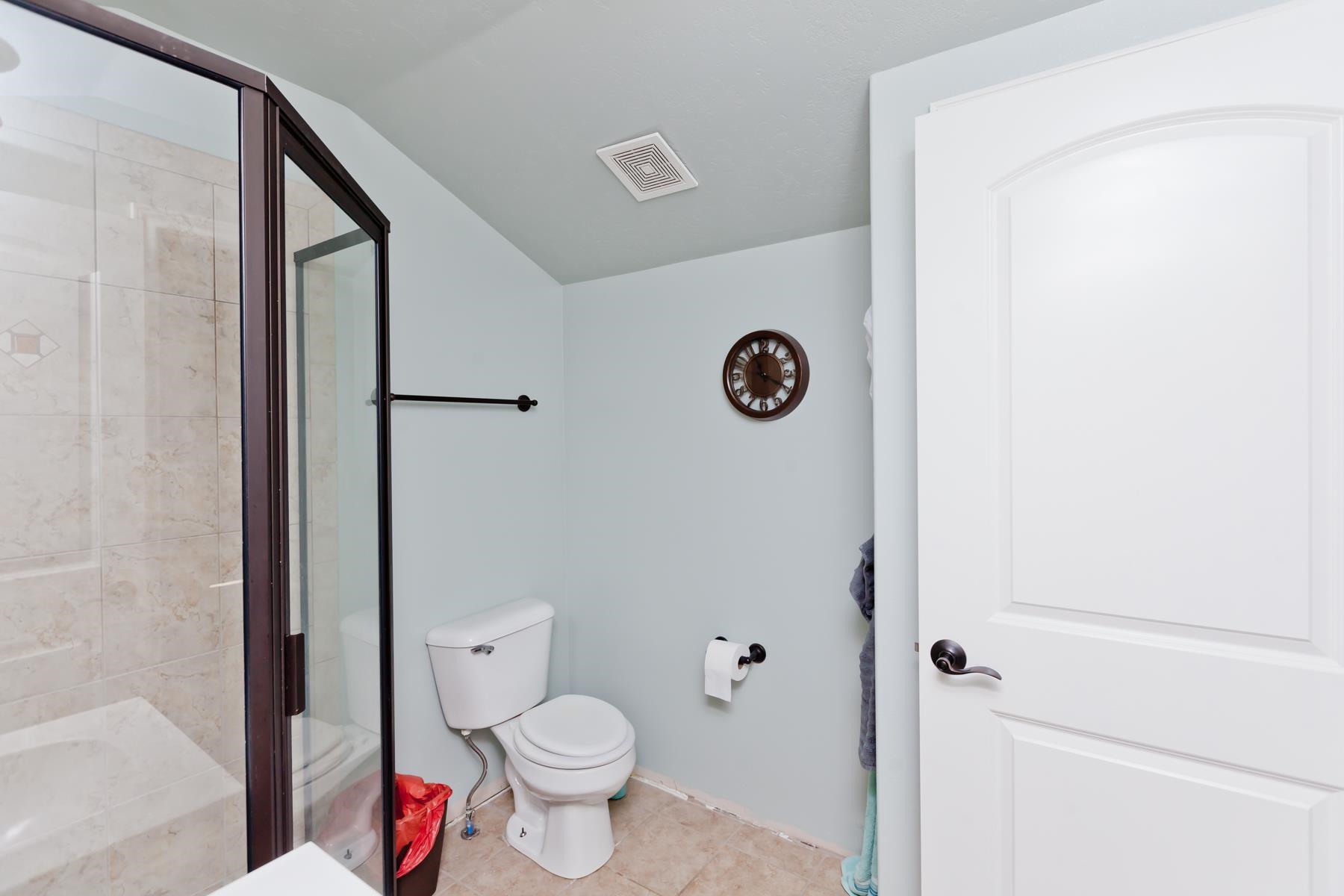 1037 Wingate Drive Fruita, CO 81521 - Photo 32 of 42 a bathroom with a toilet and a shower