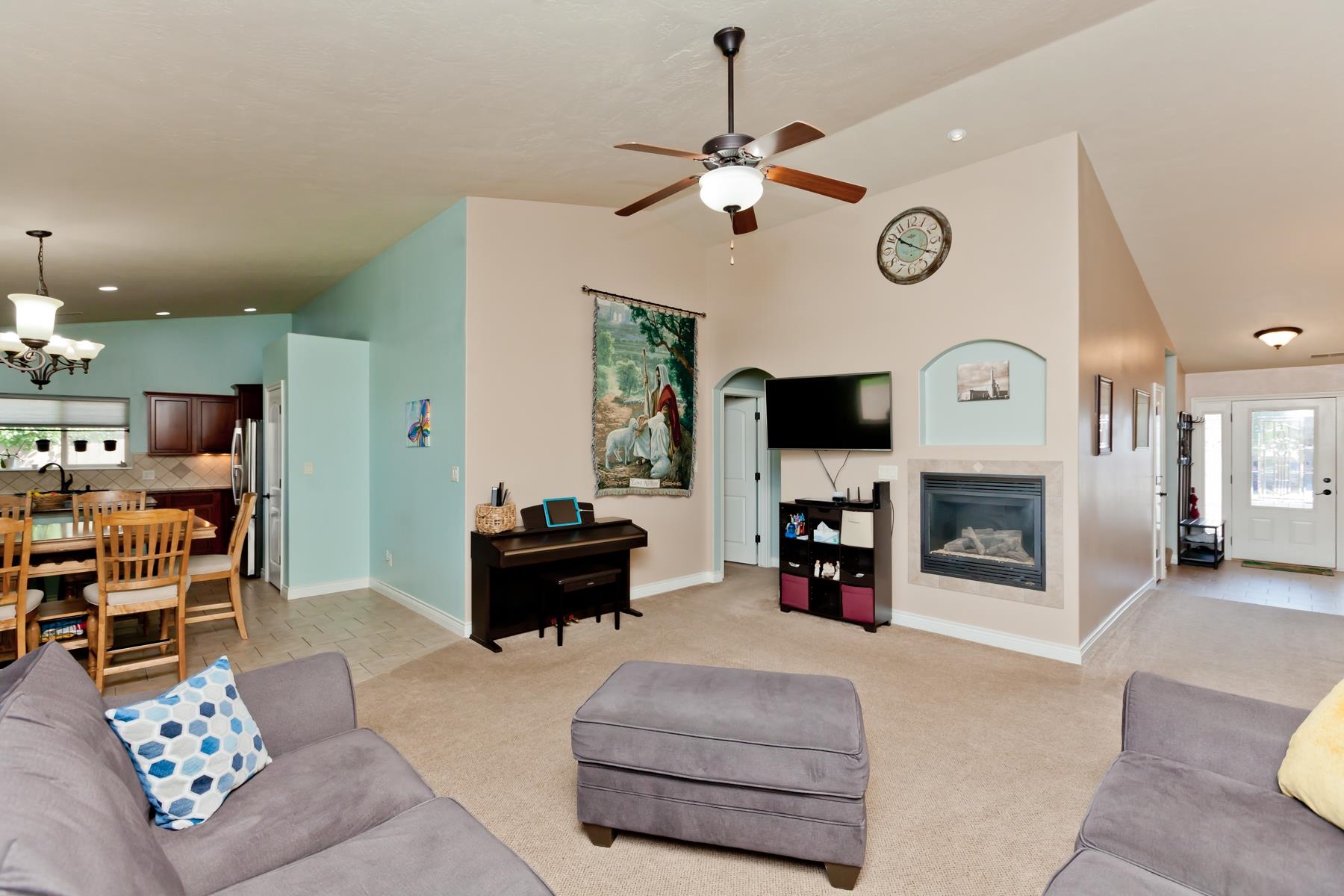 1037 Wingate Drive Fruita, CO 81521 - Photo 6 of 42 a living room with furniture and a fireplace